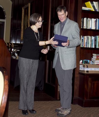 Dr. Morris awards Dr. Postlethwait his plaque