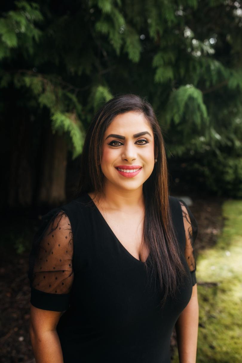 A photo of Dr. Riya Paranthan outdoors.