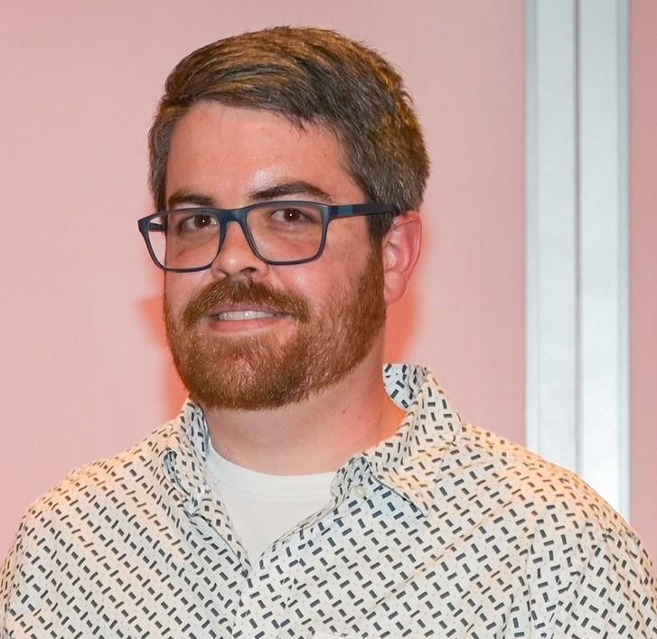 A headshot of Dr. Brent Simpson.